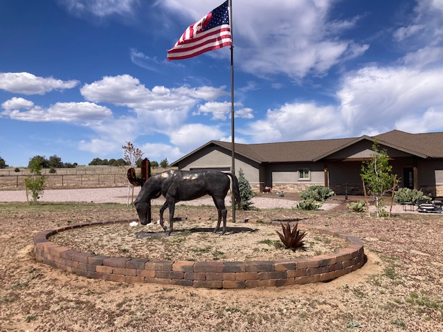 Complete revitalizing of pavers, clean, sand and reseal of approx. 3000 sq ft area, front and rear patios, firepit, driveway and planter in Prescott Williamson Valley Arizona