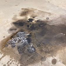 Heavy-Diesel-engine-oil-stains-removed-from-concrete-driveway-in-Prescott-Valley-Arizona-using-environmentally-safe-cleaner-with-hot-water-pressure-washer 0