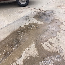 Heavy-Diesel-engine-oil-stains-removed-from-concrete-driveway-in-Prescott-Valley-Arizona-using-environmentally-safe-cleaner-with-hot-water-pressure-washer 2