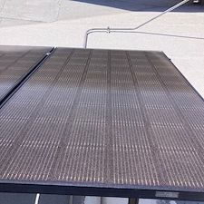 Top-quality-cleaning-of-32-solar-panel-cleaning-of-paint-overspray-mounted-on-a-flat-roof-in-Prescott-Williamson-Valley-Arizona-using-special-paint-remover-safe-for-solar-panel-and-DI-water 2