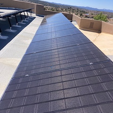 Top-quality-cleaning-of-32-solar-panel-cleaning-of-paint-overspray-mounted-on-a-flat-roof-in-Prescott-Williamson-Valley-Arizona-using-special-paint-remover-safe-for-solar-panel-and-DI-water 3