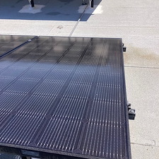 Top-quality-cleaning-of-32-solar-panel-cleaning-of-paint-overspray-mounted-on-a-flat-roof-in-Prescott-Williamson-Valley-Arizona-using-special-paint-remover-safe-for-solar-panel-and-DI-water 5